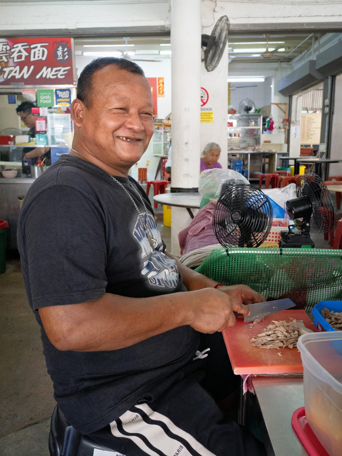 Hawker at the Lor Mee / Hokkien Mee stand in Cheah Yew Market