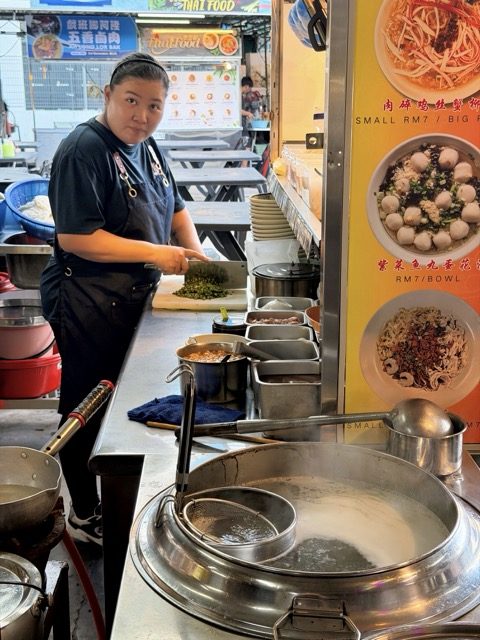 Hawker at the Mee Suah Koh stall at 33 Best Food Hub