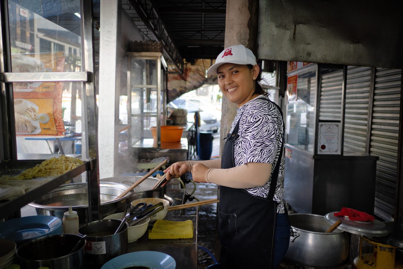 Hawker at the Wantan Mee stand in Cheah Yew Market